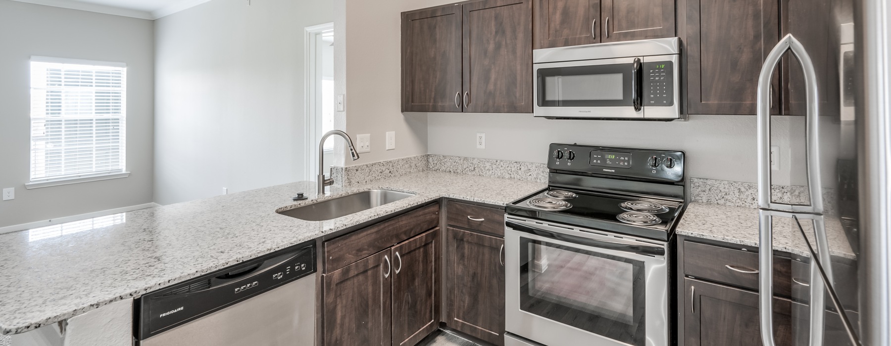 kitchen with brown cabinets