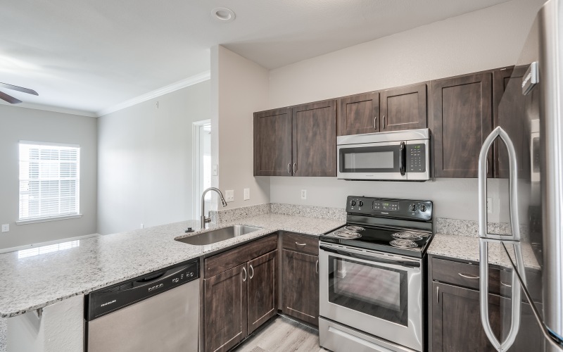 a kitchen with a wood floor