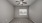 bedroom with wide open window and ceiling fan