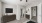 a room with a tv and a dresser